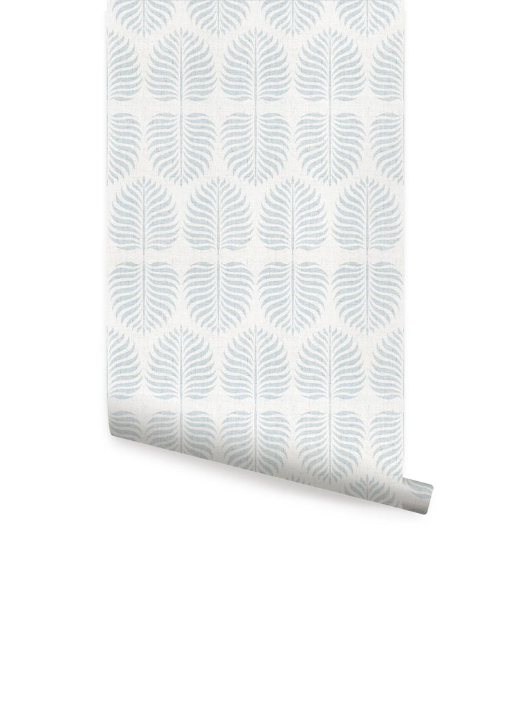 Soft blue fern pattern wallpaper roll with delicate leaf designs on white background. Fern Pattern Blue Fabric Peel and Stick Wallpaper OFF PRINT 24 x 108 Inches. Perfect for small DIY projects, adding a touch of nature to any space. Clearance Wallpaper Sticker - OFF PRINTS, Dorm Room Ideas and Trends