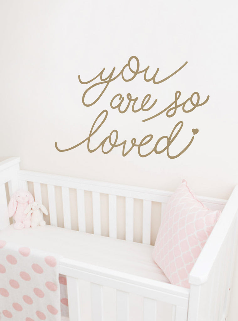 You Are So Loved" wall decal with diamonds, dots, and a heart motif, perfect for adorning kid's bedrooms and baby nurseries. The set includes separate decals for the quote, heart, dots, and diamonds, allowing for customizable placement. Available in gold metallic, warm grey, and white color options. Top Sellers, Wall Decals, Lettering and Quote Decals, Baby Nursery and Kids Wall Decals, All Products, Wall Decals Quotes